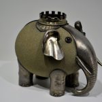 elephant, jewels, antique, piggy bank, jewelry, decoration, gallery, green, silver, platinum, hand made, crafted, rare, photography, white background, trunk, four legged, creation, creature, carved, cigarette holder, dorothy artie mcferrin gallery, tusk, classic, old, vintage, aged, retro, artistic, art, history, fashion, black, timeless, style, museum, science, expensive, decorative, fashionable, elegant, white, stylish, design, metal, business, classy, model, creative, ash tray, bank, collection, 1980's, special, hand crafted, workman, carving, cave, shape, molding, craftsmanship, craftwork, craft, bronze, africa, african elephant, asia, boar, mammoth, mastodon, pachyderm, tusker, bodily, natural, brute, mammalian, wild, beastly, bestial, brutish, corporeal, earthly, earthy, feral, fleshy, muscular, physical, sensual, untamed, zoological, artifact, costly, beauty, collectors, item, piece, lavish, rich, luxurious, toy, gray science, gray bank, gray elephant, gray history, gray creative, gray jewelry, mastodon, mastodon, mastodon, mastodon, mastodon, costly